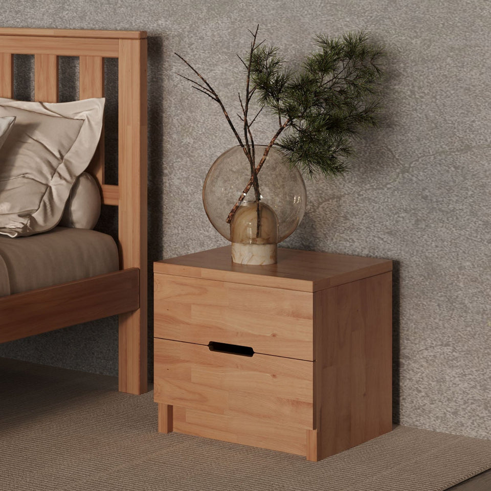 wooden beech bedside table in a bedroom