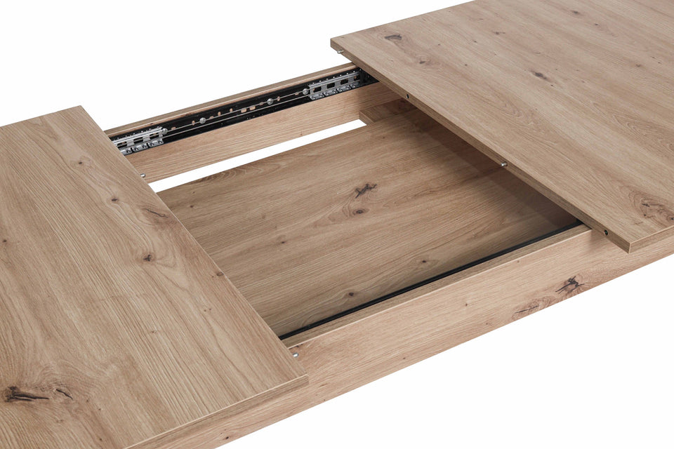 Extension mechanism of the dining table with central extension leaf